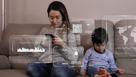 Animation-of-data-processing-over-asian-woman-kissing-her-son-and-using-smartphone-at-home