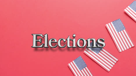 Animation-of-elections-text-over-flags-of-united-states-of-america-on-red-background