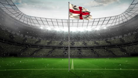 Animation-of-golden-confetti-falling-over-waving-england-flag-against-sport-stadium
