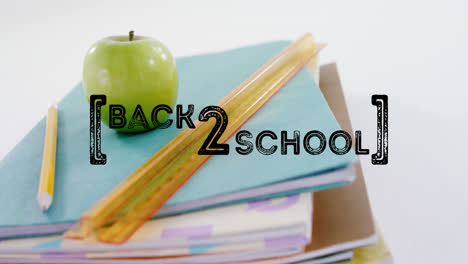 Animation-of-back-to-school-text-over-apple-and-school-items
