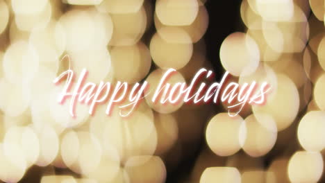 Animation-of-happy-holidays-text-over-yellow-spots-of-light-background