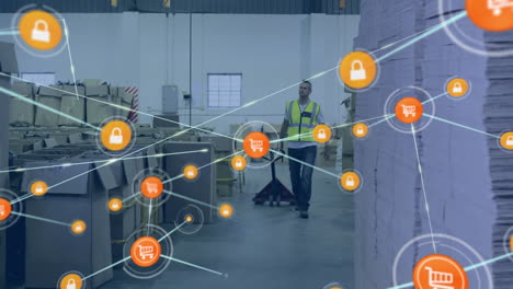 Animation-of-network-of-digital-icons-over-caucasian-male-worker-with-pallet-walking-at-warehouse