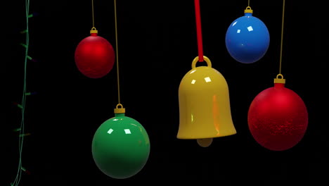 Coloured-christmas-string-lights-flashing-and-colourful-baubles-swinging-on-black-background