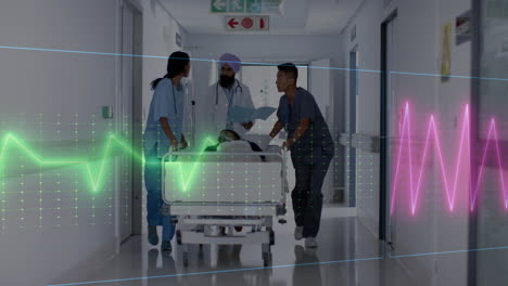 Animation-Eines-Herzfrequenzmonitors-über-Einem-Team-Verschiedener-Ärzte,-Die-Einen-Patienten-Im-Operationssaal-Behandeln