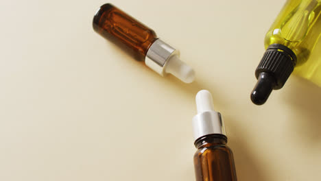 Close-up-of-dropper-serum-bottles-on-white-background-with-copy-space