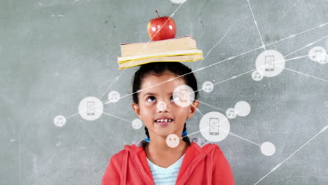 Animation-of-network-of-icons-over-biracial-girl-balancing-books-and-apple-on-her-head-at-school