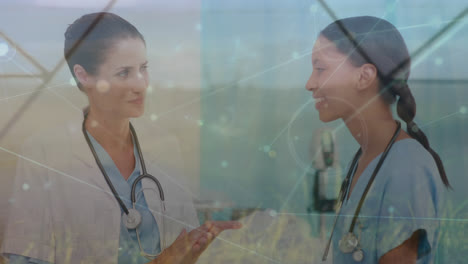 Animation-of-network-of-connections-over-diverse-female-doctors-talking
