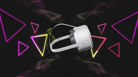 Animation-of-vr-headset-over-neon-triangle-shapes-and-data-processing
