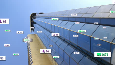 Animation-of-changing-numbers,-icons-in-notification-bars,-low-angle-view-of-building-against-sky
