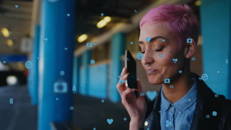Animation-of-connected-icons,-biracial-woman-talking-on-cellphone-while-waiting-for-train-at-station