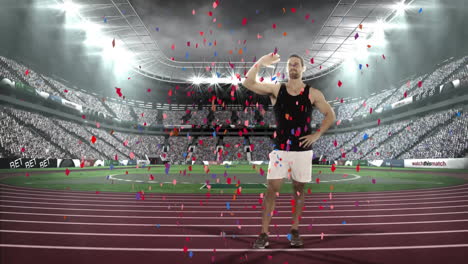 Animation-Von-Konfetti-über-Einem-Kaukasischen-Läufer,-Der-Vor-Dem-Himmel-In-Ein-Völlig-überfülltes-Stadion-Winkt