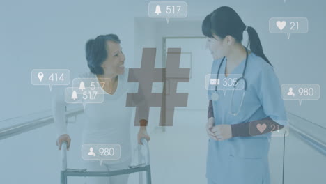 Animation-of-social-media-icons-over-asian-female-doctor-with-patient-in-hospital