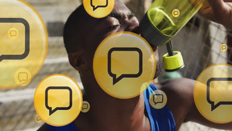 Animation-of-message-boxes-icons,-tired-african-american-athlete-drinking-water-after-training