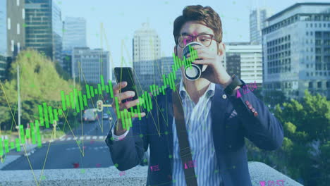 Animation-of-graphs-with-changing-numbers,-asian-man-looking-at-cellphone-while-drinking-coffee