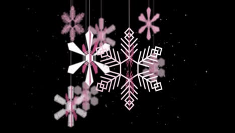 Animation-Von-Weihnachtskugeln-Und-Fallendem-Schnee-Auf-Schwarzem-Hintergrund