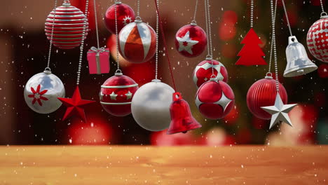 Animation-of-christmas-baubles-decorations-over-christmas-tree-background