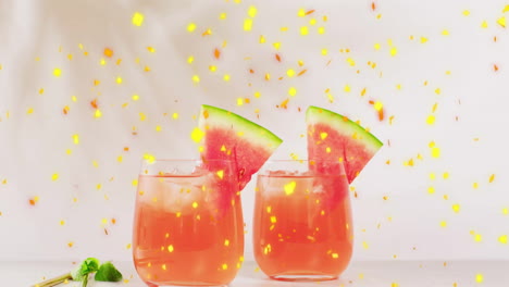 Animation-of-confetti-falling-and-cocktails-on-white-background