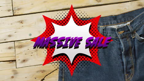 Animation-of-retro-massive-sale-text-over-denim-trousers-background