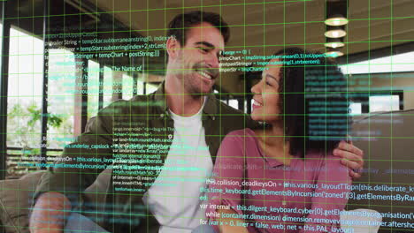 Animation-of-multicolored-computer-language-over-diverse-couple-looking-at-each-other