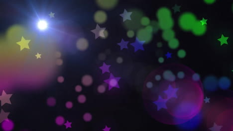 Animación-De-Estrellas-Y-Círculos-Multicolores-Con-Destellos-De-Lentes-En-Movimiento-Sobre-Fondo-Negro
