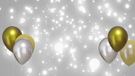Animation-of-gold-and-silver-balloons-over-silver-background