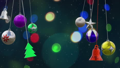 Animation-of-christmas-baubles-decorations-over-blue-background