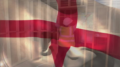Animation-Einer-Flagge-Englands,-Die-über-Einem-Kaukasischen-Ingenieur-Mit-Helm-Weht,-Der-Messungen-Vornimmt