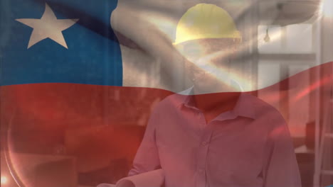 Animation-of-flag-of-chile-over-biracial-engineer-wearing-helmet-walking-with-blueprints
