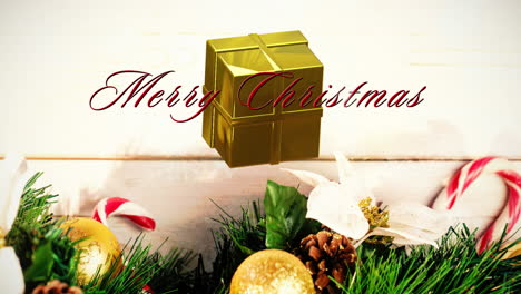 Animation-of-merry-christmas-text-over-christmas-decorations-on-wooden-background