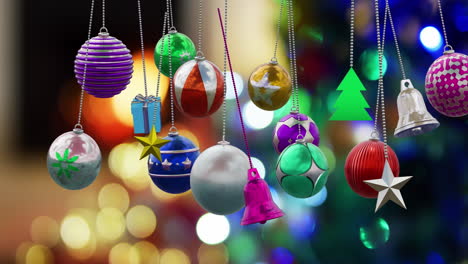 Animation-of-christmas-baubles-over-christmas-tree-background