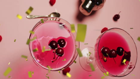 Animation-Von-Fallendem-Konfetti-Und-Cocktail-Auf-Rosa-Hintergrund