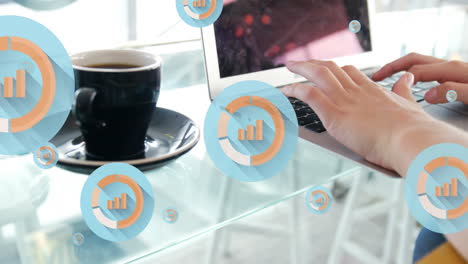 Animation-of-multiple-graph-icon-in-circles-over-coffee-cup-and-caucasian-woman-working-on-laptop