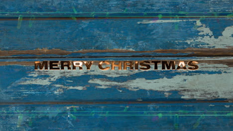 Animation-Von-Frohe-Weihnachten-Text-über-Blauem-Holzhintergrund