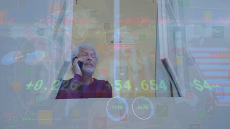Animation-of-graphs,-trading-board,-senior-caucasian-looking-through-window-and-talking-on-cellphone