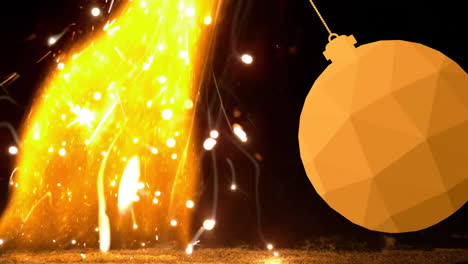 Animation-of-hanging-bauble-over-fireworks-and-fire-against-black-background