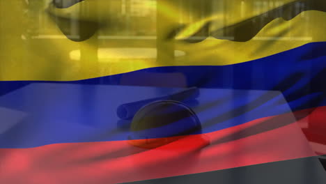 Animation-of-flag-of-colombia-waving-over-yellow-helmet-and-floor-plan-on-table-against-glass-window