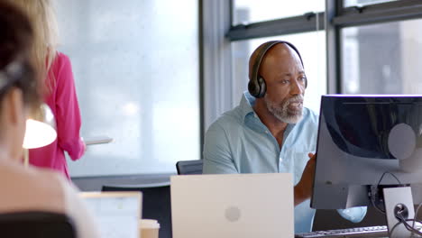 Business-African-American-man-focused-at-his-office-desk
