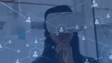 Animation-of-connected-icons-over-thoughtful-caucasian-woman-using-vr-headsets