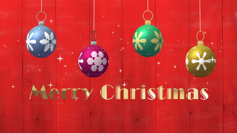Animation-Von-Frohe-Weihnachten-Text-Und-Weihnachtskugeln-Auf-Rotem-Hintergrund