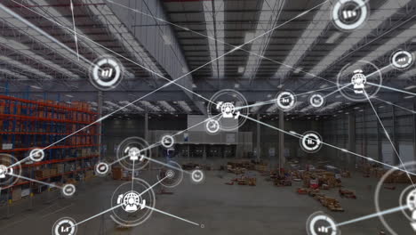 Animation-of-icons-connected-with-lines-over-aerial-view-of-warehouse