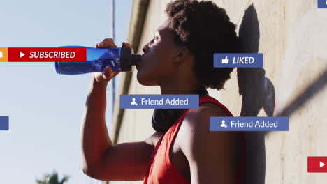 Animation-of-notification-bars-over-african-american-athlete-taking-wall-support-and-drinking-water