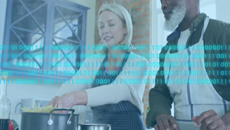 Animation-of-binary-codes-over-diverse-senior-couple-together-cooking-pasta-in-kitchen-at-home