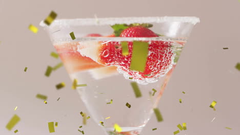 Animation-of-confetti-falling-and-cocktail-on-white-background