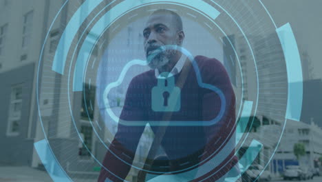 Animation-of-cloud-in-loading-circles,-senior-thoughtful-african-american-man-sitting-outdoor