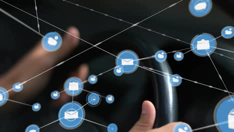 Animation-of-icons-connected-with-lines-over-cropped-hands-of-caucasian-man-on-steering-wheel