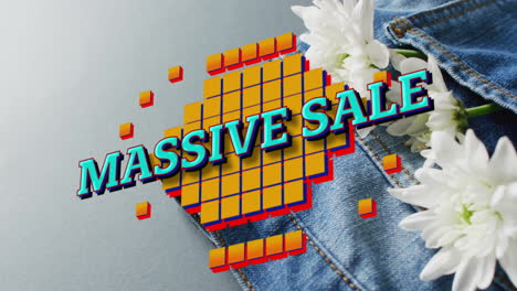 Animation-of-massive-sale-text-over-denim-trousers-on-grey-background