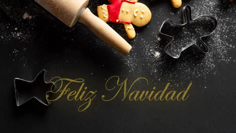 Animation-of-feliz-navidad-text-and-christmas-cookies-on-black-background