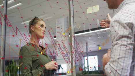 Animation-of-multiple-graphs-with-changing-numbers-over-diverse-coworkers-reports-on-glass-wall