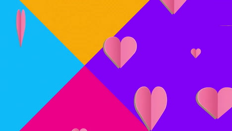 Animation-of-multiple-heart-icons-over-multicolored-triangles-against-white-background