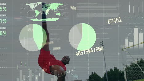 Animation-of-infographic-interface,-numbers,-african-american-soccer-player-practicing-flying-kick